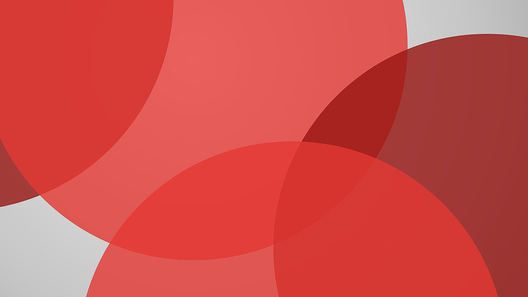 rote Kreise, die sich überschneiden auf grauem Hintergrund